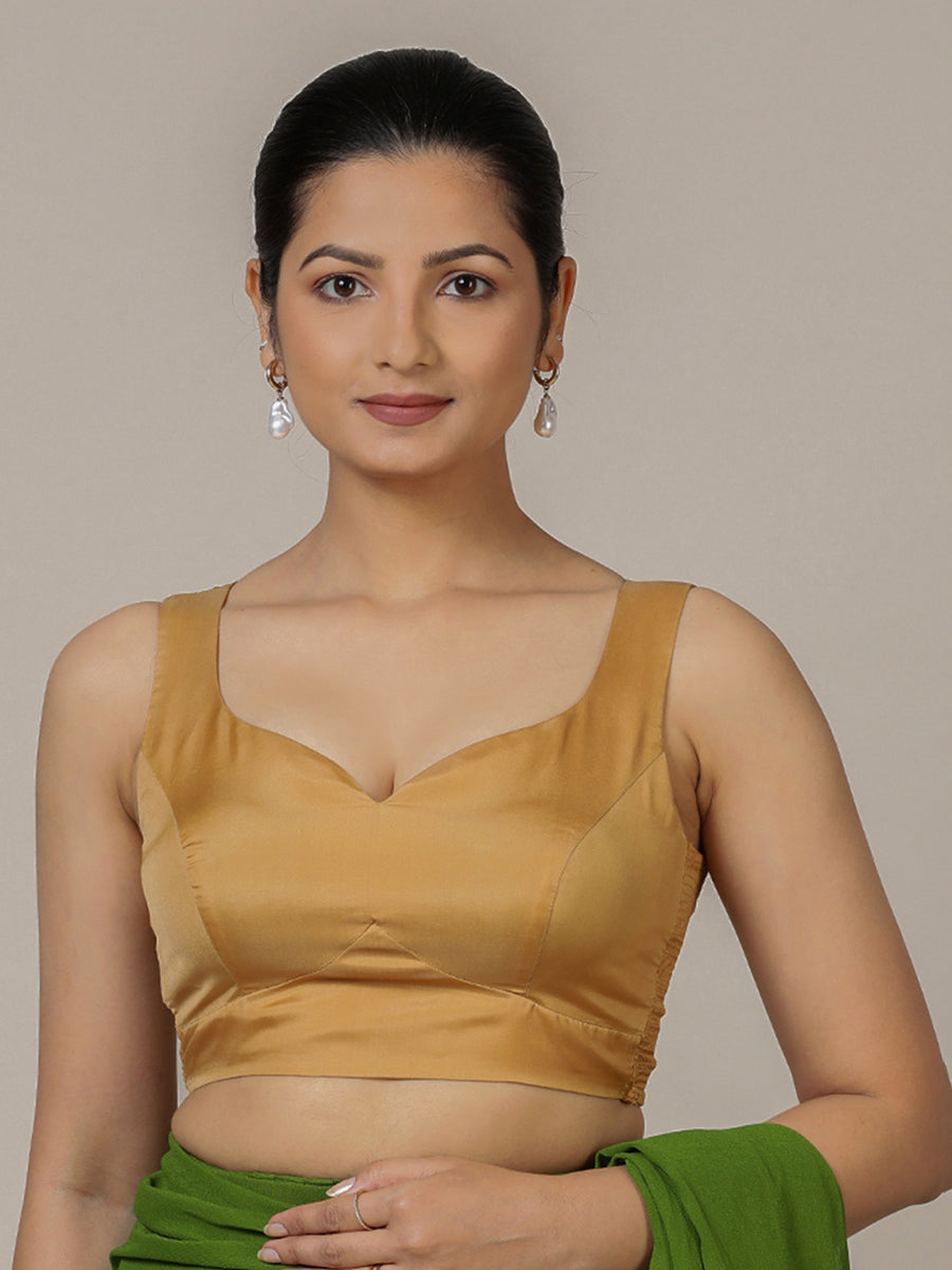 Ishika x Rozaana Saree Blouse, in Gold Vegan Silk, featuring sleeveless and sweetheart neckline, made for party & festive.