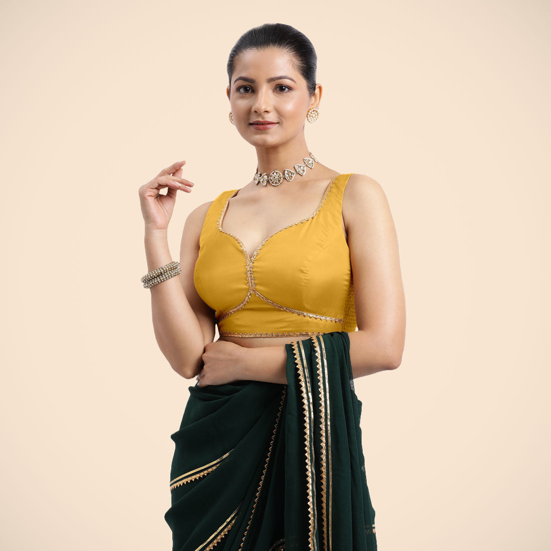 Ishika x Tyohaar Saree Blouse, in Yellow Artificial Silk, featuring sleeveless and sweetheart neckline.