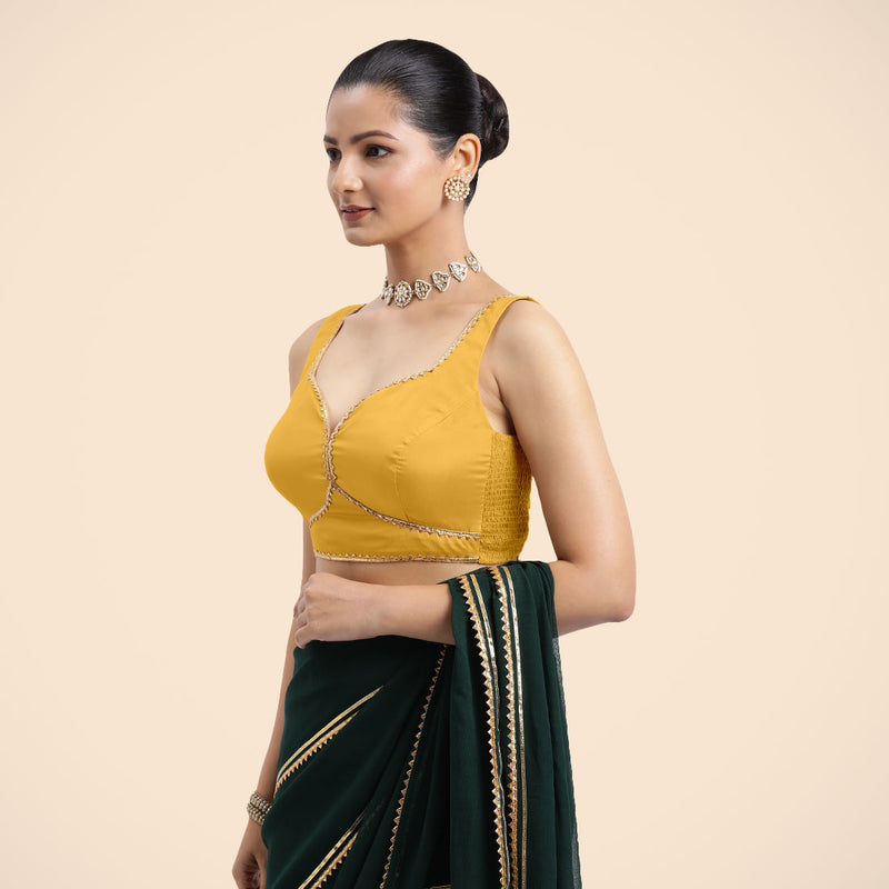Ishika x Tyohaar | Sleeveless Marigold Yellow FlexiFit™ Gota Embellished Saree Blouse with Sweetheart Neck-Binks