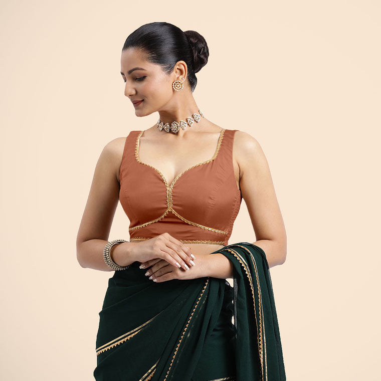 Ishika x Tyohaar Saree Blouse, in Copper Vegan Silk, featuring sleeveless and sweetheart neckline, made for party & festive.