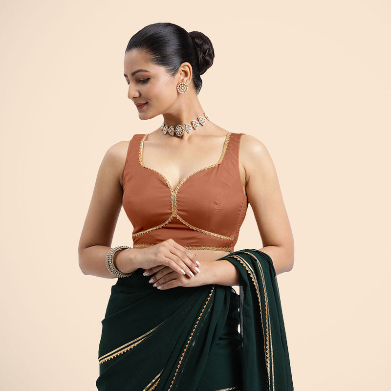 Ishika x Tyohaar | Metallic Copper Sleeveless FlexiFit™ Saree Blouse with Beetle Leaf Neckline with Golden Gota Lace and Back Cut-out with Tie-Up-Binks