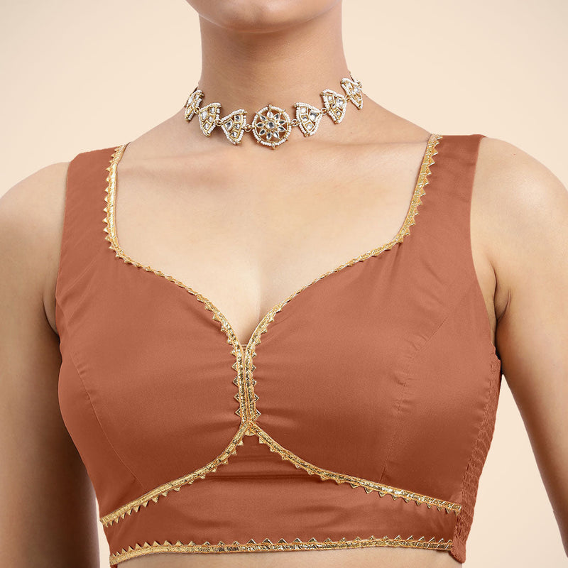 Ishika x Tyohaar | Metallic Copper Sleeveless FlexiFit™ Saree Blouse with Beetle Leaf Neckline with Golden Gota Lace and Back Cut-out with Tie-Up-Binks