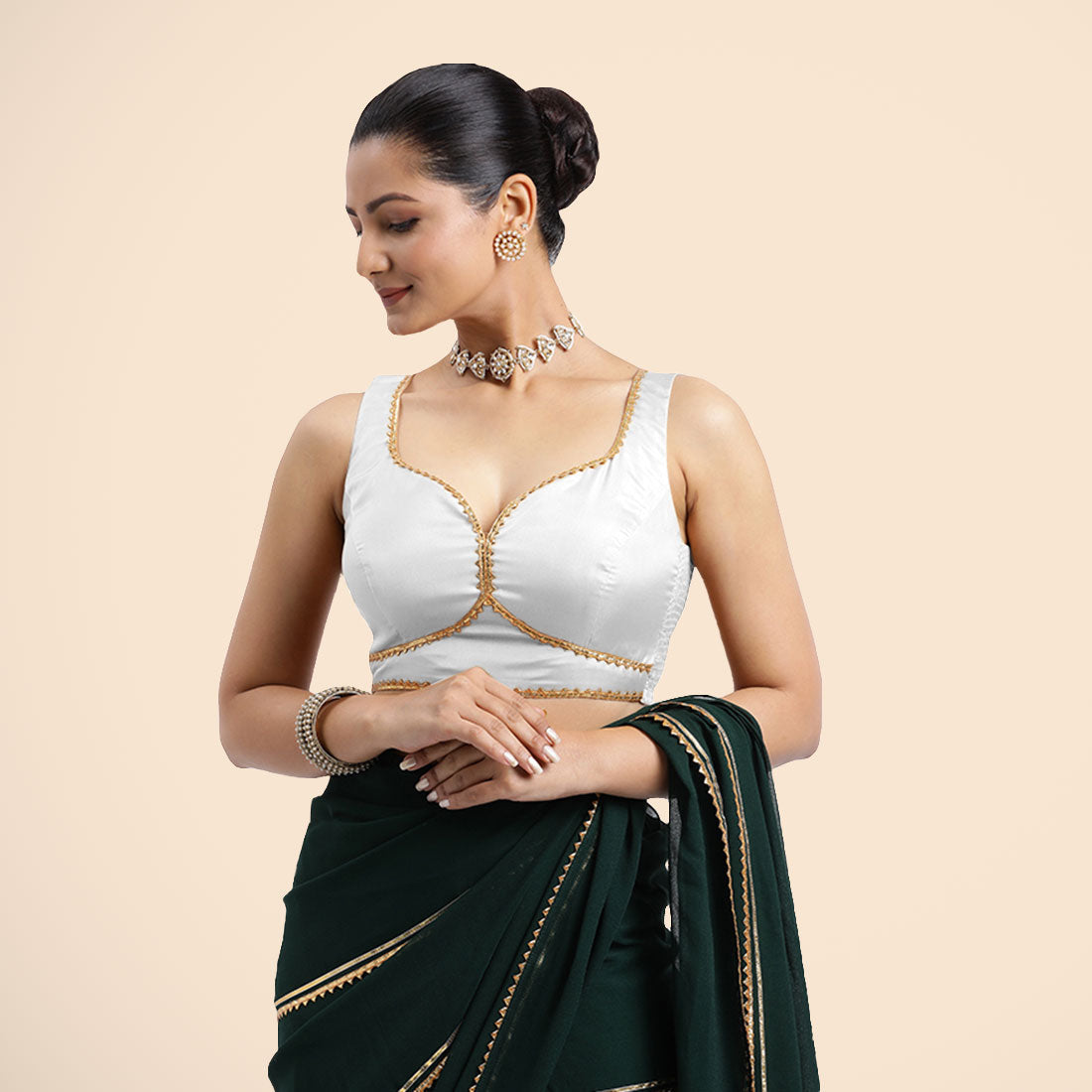 Ishika x Tyohaar Saree Blouse, in White Vegan Silk, featuring sleeveless and sweetheart neckline, made for party & festive.