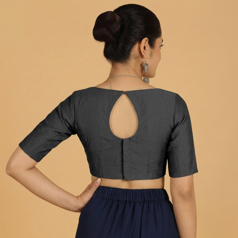 Jigyasa x Tyohaar Saree Blouse, in Black Chandheri, featuring elbow sleeves and boat neckline, made for party & festive.