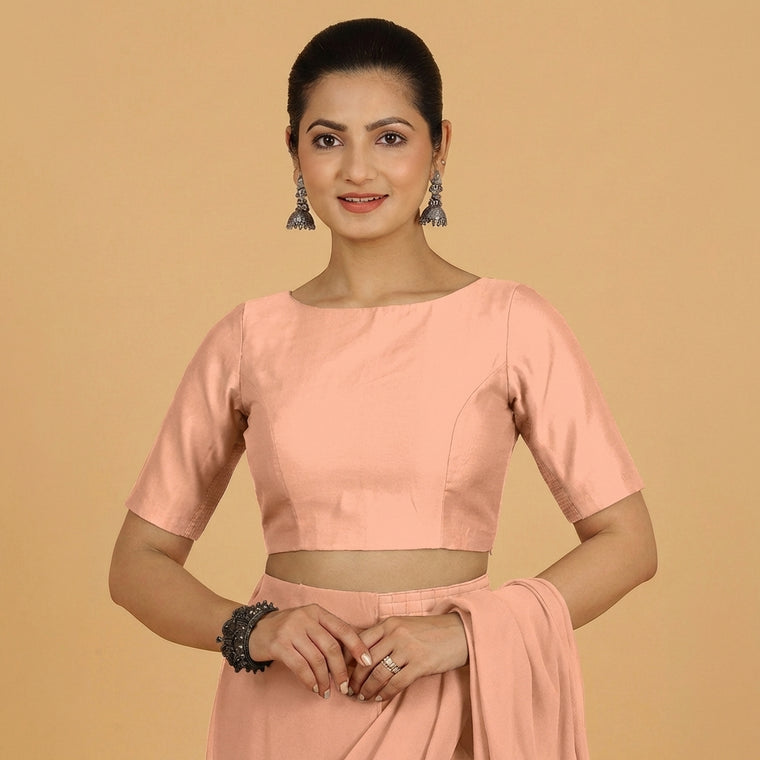 Jigyasa x Tyohaar Saree Blouse, in Peach Chandheri, featuring elbow sleeves and boat neckline, made for party & festive.