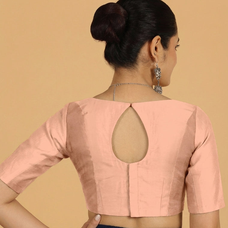Jigyasa x Tyohaar Saree Blouse, in Peach Chandheri, featuring elbow sleeves and boat neckline, made for party & festive.