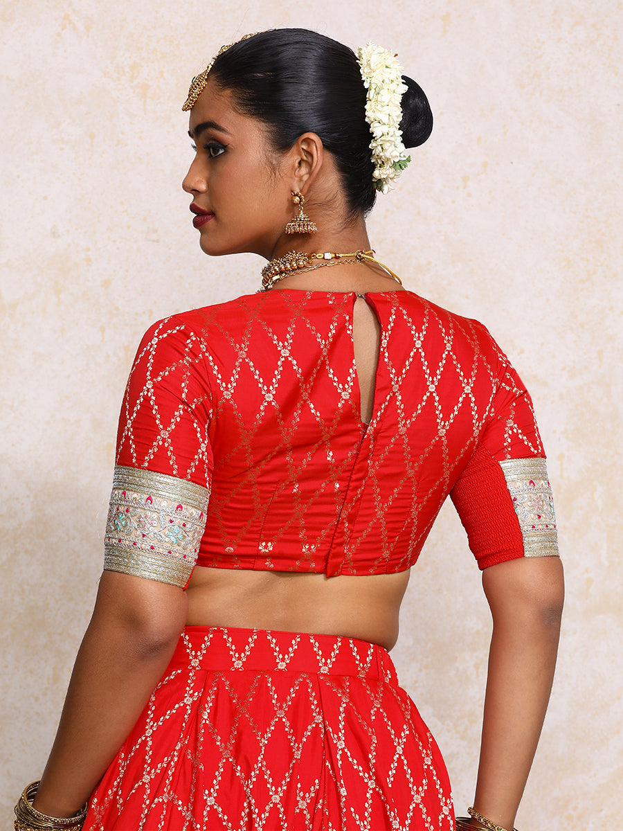 Kashvi x Tyohaar Saree Blouse, in Red Viscose Silk Brocade, featuring elbow sleeves and jewel neckline (view 2).