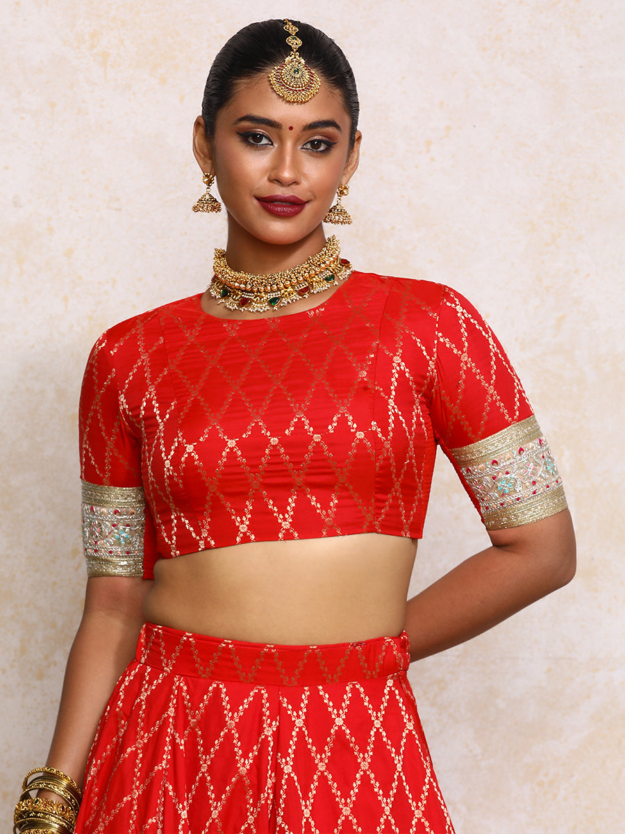 Kashvi x Tyohaar Saree Blouse, in Red Viscose Silk Brocade, featuring elbow sleeves and jewel neckline (view 7).