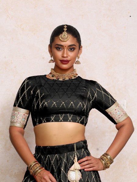 Kashvi x Tyohaar Saree Blouse, in Black Viscose Silk Brocade, featuring elbow sleeves and jewel neckline (view 7).