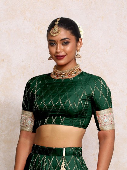 Kashvi x Tyohaar Saree Blouse, in Green Viscose Silk Brocade, featuring elbow sleeves and jewel neckline (view 3).