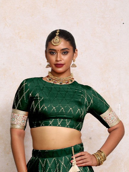 Kashvi x Tyohaar Saree Blouse, in Green Viscose Silk Brocade, featuring elbow sleeves and jewel neckline (view 6).