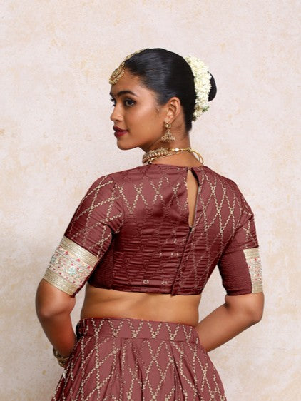 Kashvi x Tyohaar Saree Blouse, in Maroon Viscose Silk Brocade, featuring elbow sleeves and jewel neckline (view 2).