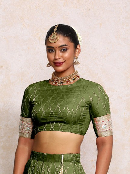 Kashvi x Tyohaar Saree Blouse, in Green Viscose Silk Brocade, featuring elbow sleeves and jewel neckline (view 3).