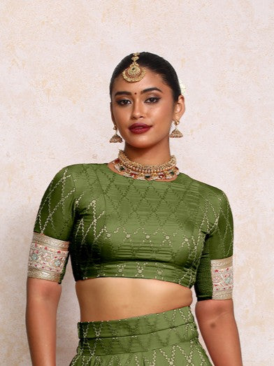 Kashvi x Tyohaar Saree Blouse, in Green Viscose Silk Brocade, featuring elbow sleeves and jewel neckline (view 6).