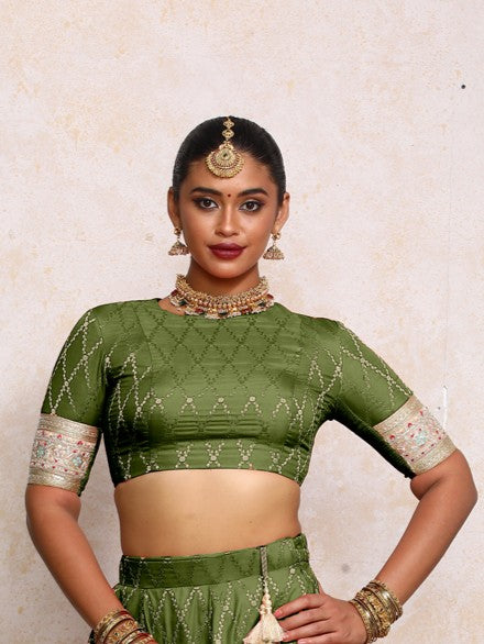 Kashvi x Tyohaar Saree Blouse, in Green Viscose Silk Brocade, featuring elbow sleeves and jewel neckline (view 7).