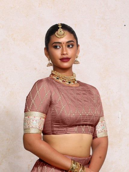 Kashvi x Tyohaar Saree Blouse, in Pink Viscose Silk Brocade, featuring elbow sleeves and jewel neckline.