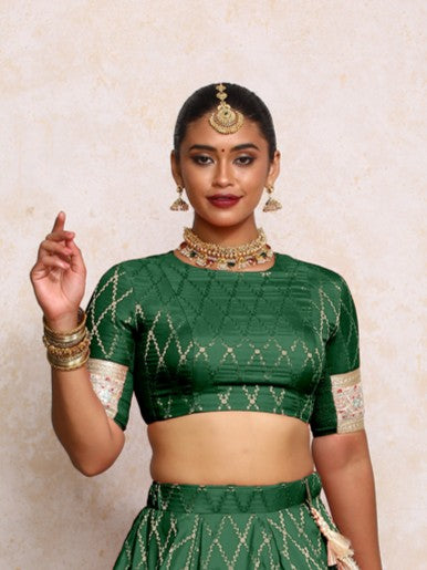 Kashvi x Tyohaar Saree Blouse, in Green Viscose Silk Brocade, featuring elbow sleeves and jewel neckline (view 5).