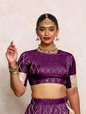 Kashvi x Tyohaar Saree Blouse, in Purple Viscose Silk Brocade, featuring elbow sleeves and jewel neckline.