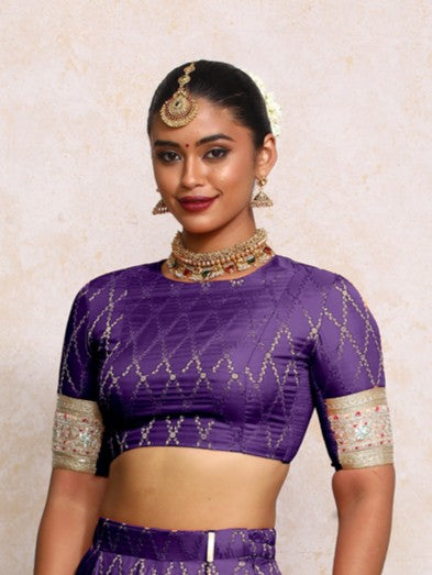 Kashvi x Tyohaar Saree Blouse, in Purple Viscose Silk Brocade, featuring elbow sleeves and jewel neckline.