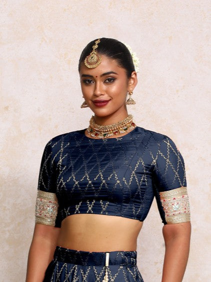 Kashvi x Tyohaar Saree Blouse, in Blue Viscose Silk Brocade, featuring elbow sleeves and jewel neckline (view 3).