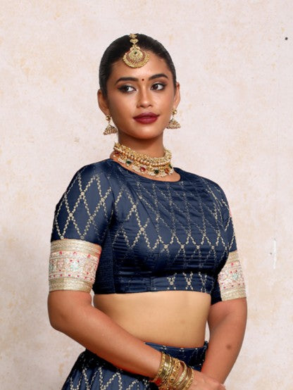 Kashvi x Tyohaar Saree Blouse, in Blue Viscose Silk Brocade, featuring elbow sleeves and jewel neckline (view 4).