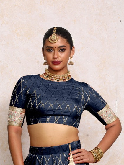 Kashvi x Tyohaar Saree Blouse, in Blue Viscose Silk Brocade, featuring elbow sleeves and jewel neckline (view 6).