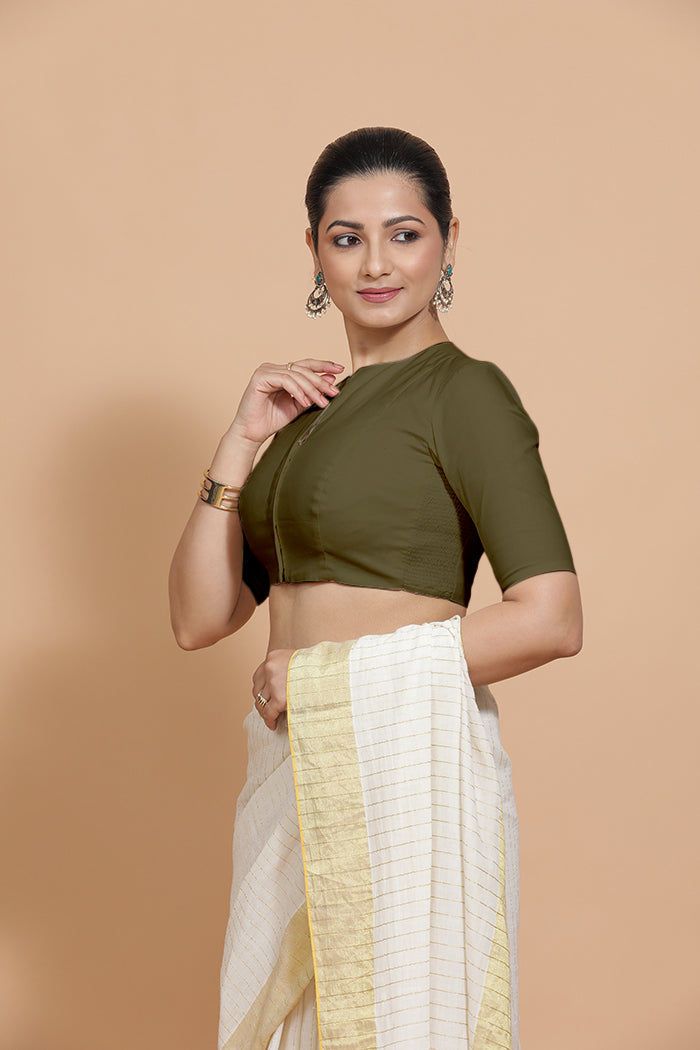 Kinal x Rozaana Saree Blouse, in Green Linen, featuring elbow sleeves and round neckline, made for daily & work.