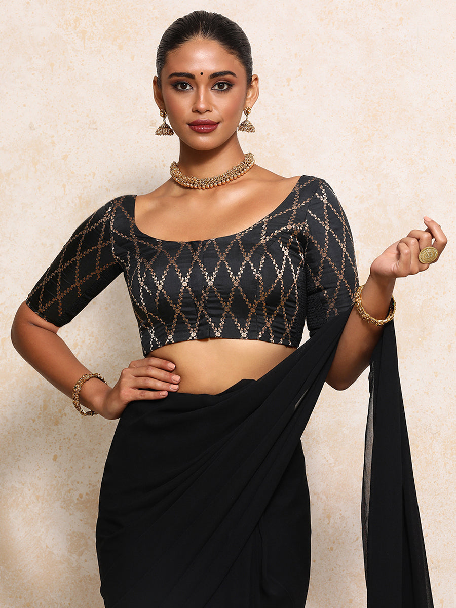 Kumkum x Tyohaar Saree Blouse, in Black Viscose Silk Brocade, featuring elbow sleeves and round neckline (view 7).