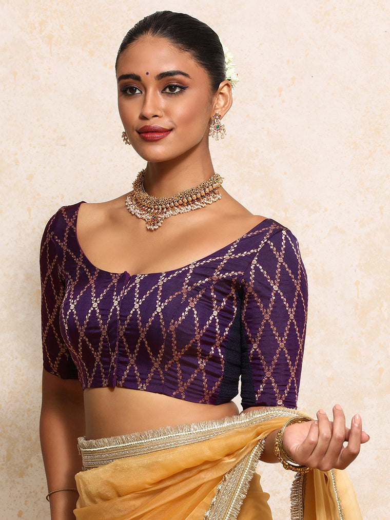 Kumkum x Tyohaar Saree Blouse, in Purple Viscose Silk Brocade, featuring elbow sleeves and round neckline.