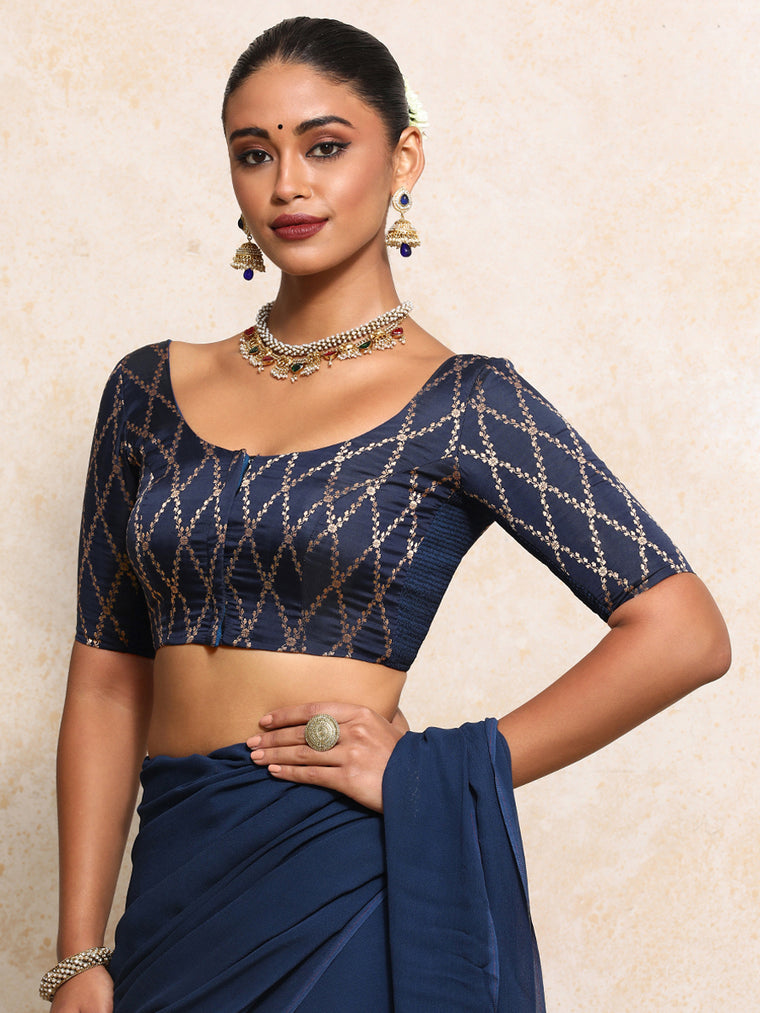 Kumkum x Tyohaar Saree Blouse, in Blue Viscose Silk Brocade, featuring elbow sleeves and round neckline.