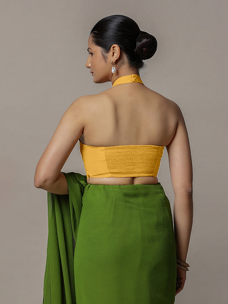 Laila x Rozaana Saree Blouse, in Yellow Artificial Silk, featuring sleeveless and halter neckline, made for party & festive.
