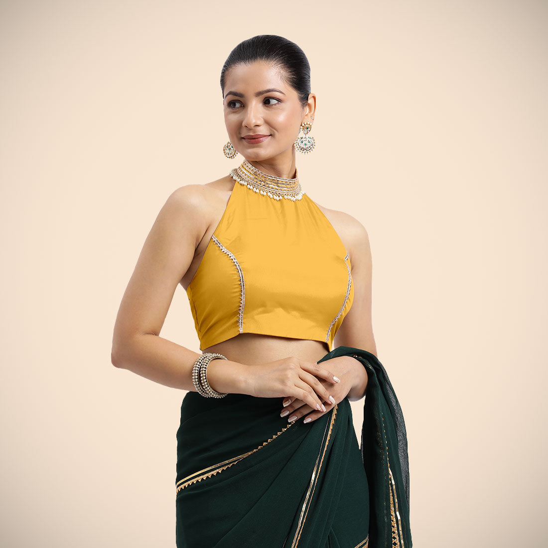 Laila x Tyohaar Saree Blouse, in Yellow Artificial Silk, featuring sleeveless and halter neckline, made for party & festive.