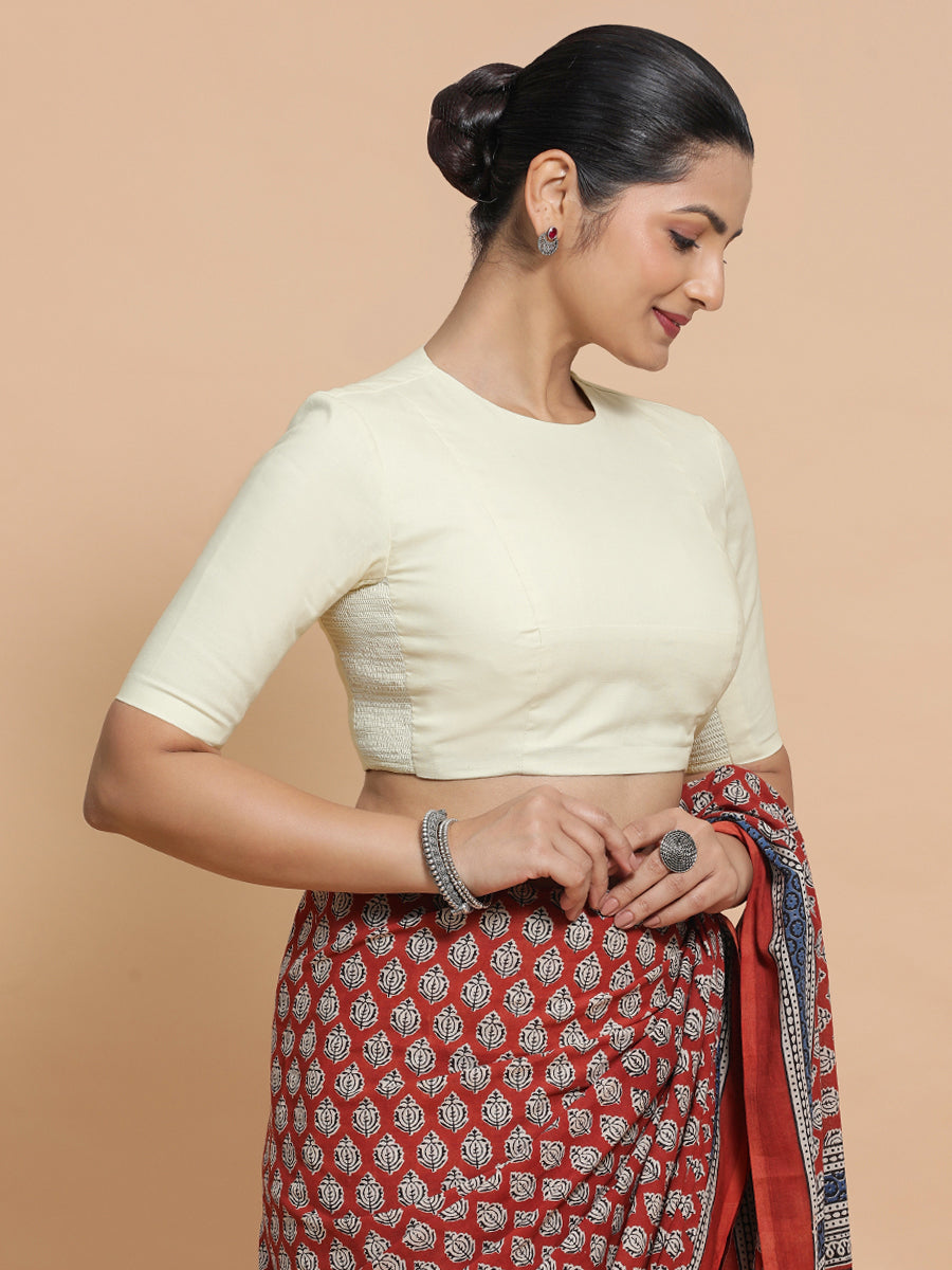 Lara x Rozaana Saree Blouse, in White Linen, featuring elbow sleeves and jewel neckline, made for daily & work.