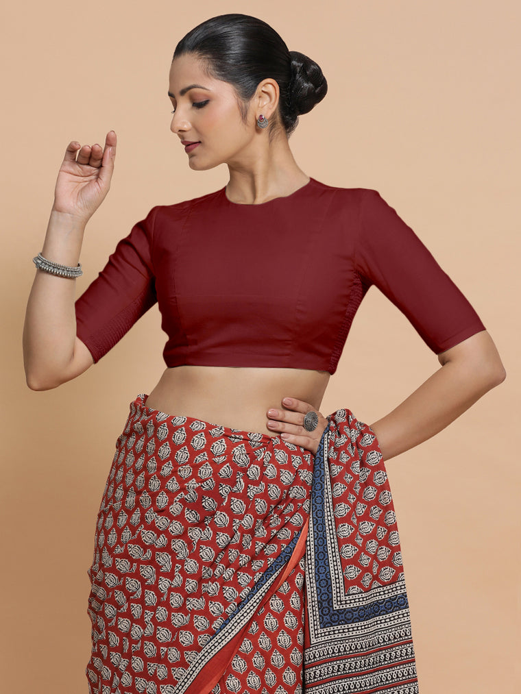 Lara x Rozaana Saree Blouse, in Red Linen, featuring elbow sleeves and jewel neckline, made for daily & work.
