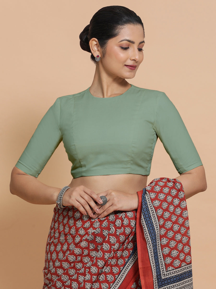 Lara x Rozaana Saree Blouse, in Green Linen, featuring elbow sleeves and jewel neckline, made for daily & work (view 5).