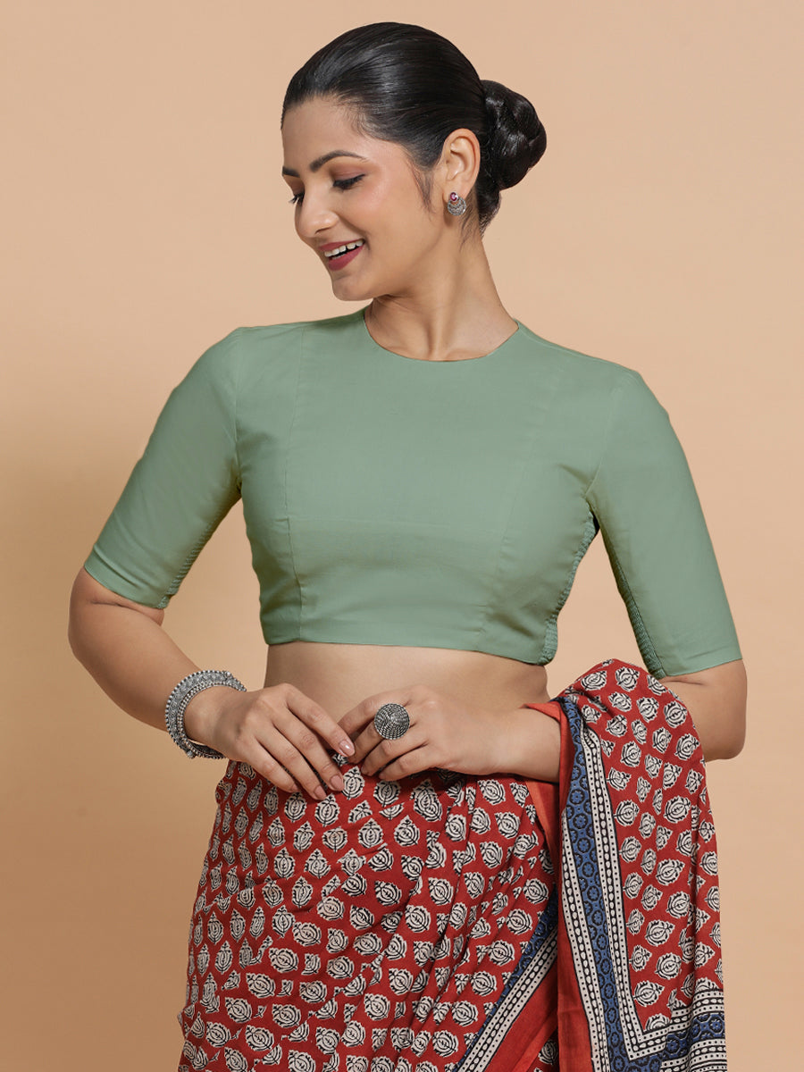 Lara x Rozaana Saree Blouse, in Green Linen, featuring elbow sleeves and jewel neckline, made for daily & work (view 8).