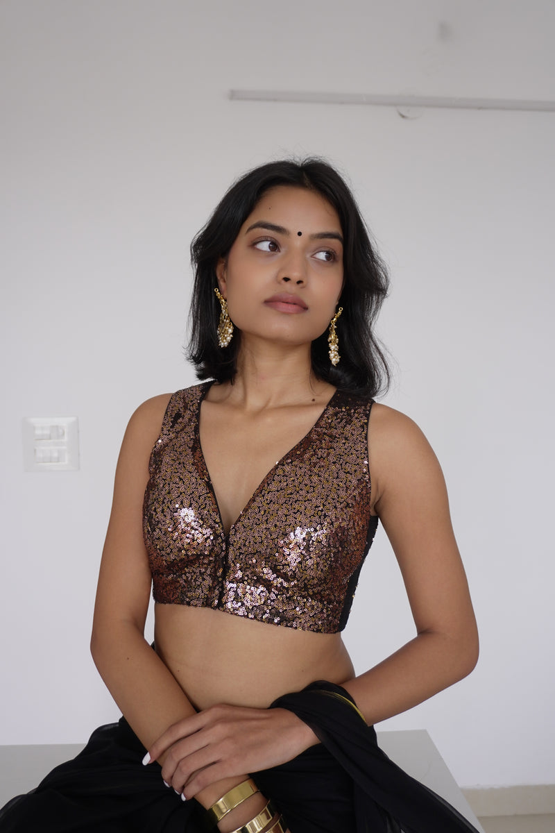 Lavanya x Tyohaar | Sleeveless Gold Sequined Saree Blouse with Curved V-Neck-Binks