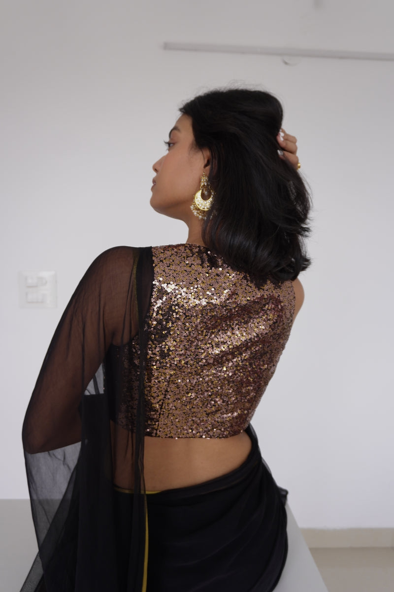 Lavanya x Tyohaar | Sleeveless Gold Sequined Saree Blouse with Curved V-Neck-Binks