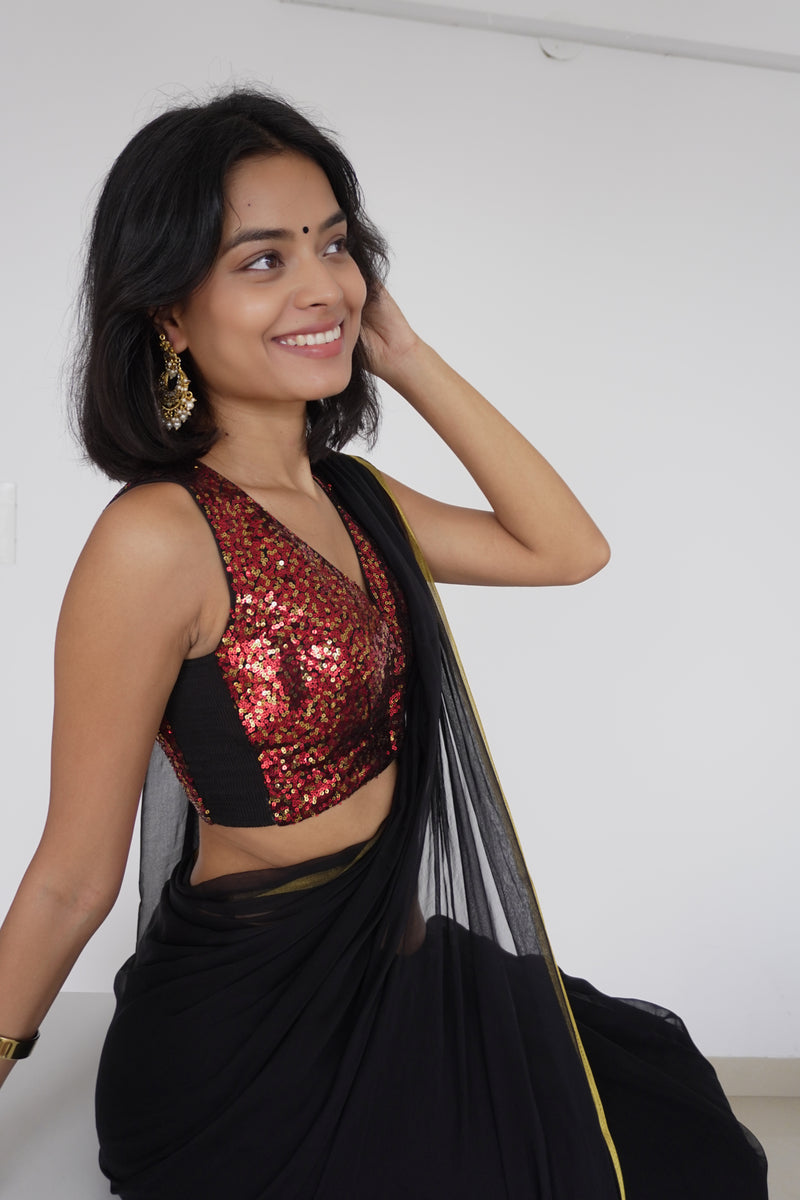 Lavanya x Tyohaar | Sleeveless Red Sequined Saree Blouse with Curved V-Neck-Binks