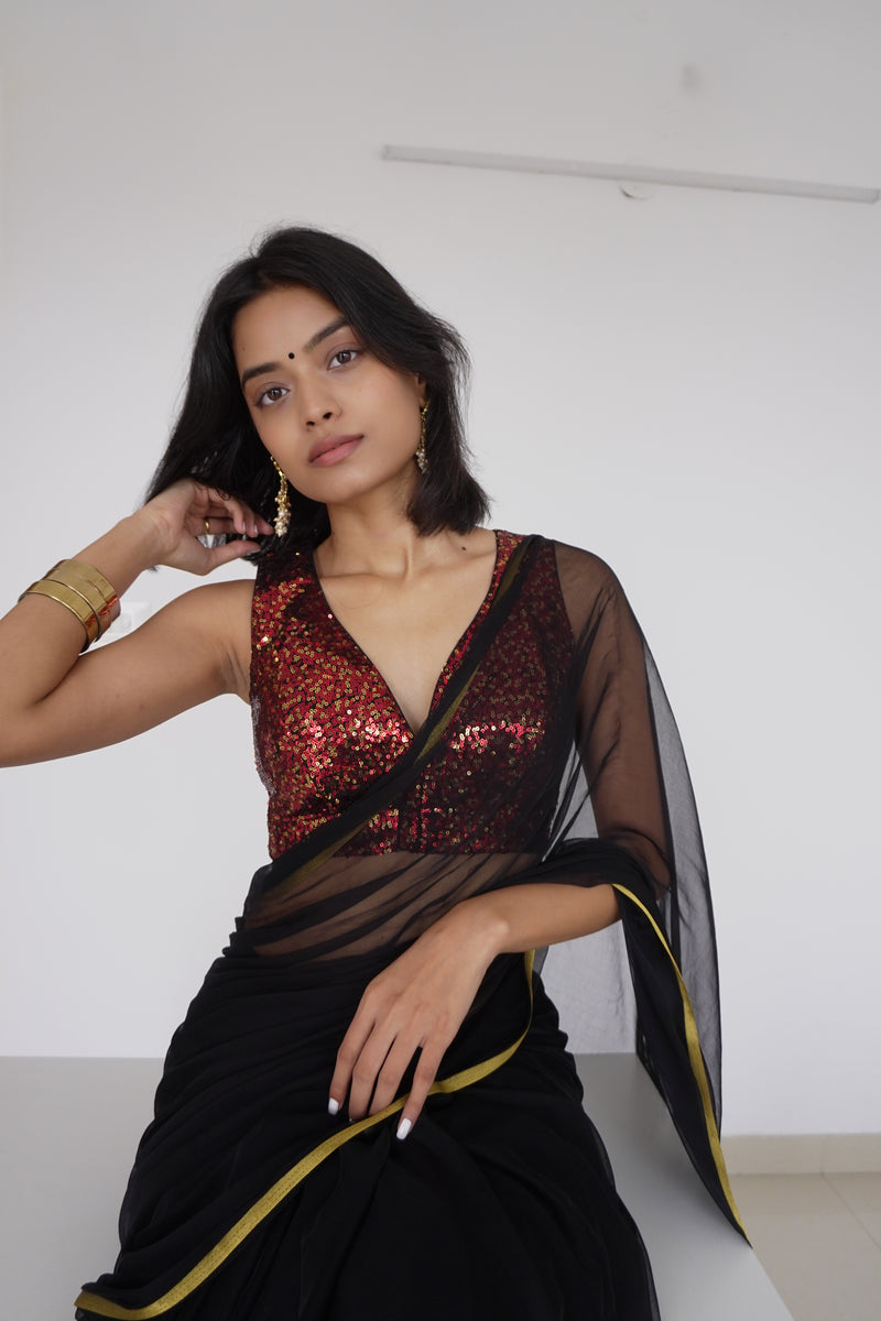 Lavanya x Tyohaar | Sleeveless Red Sequined Saree Blouse with Curved V-Neck-Binks