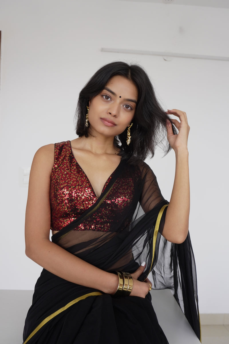 Lavanya x Tyohaar | Sleeveless Red Sequined Saree Blouse with Curved V-Neck-Binks