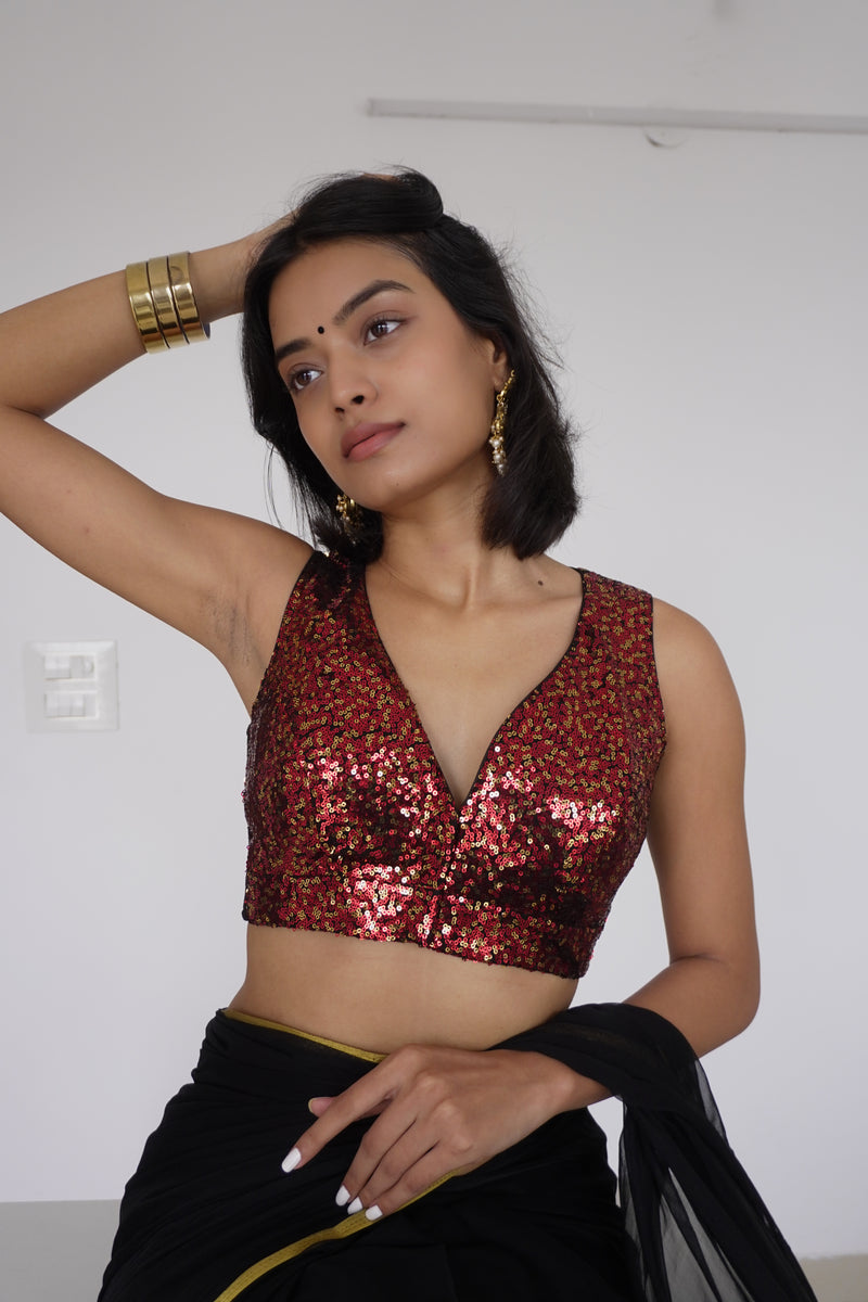 Lavanya x Tyohaar | Sleeveless Red Sequined Saree Blouse with Curved V-Neck-Binks