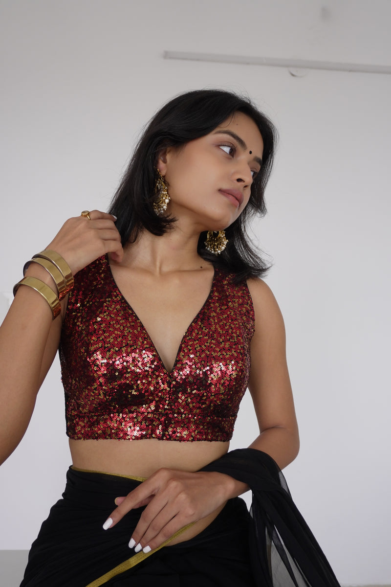 Lavanya x Tyohaar | Sleeveless Red Sequined Saree Blouse with Curved V-Neck-Binks