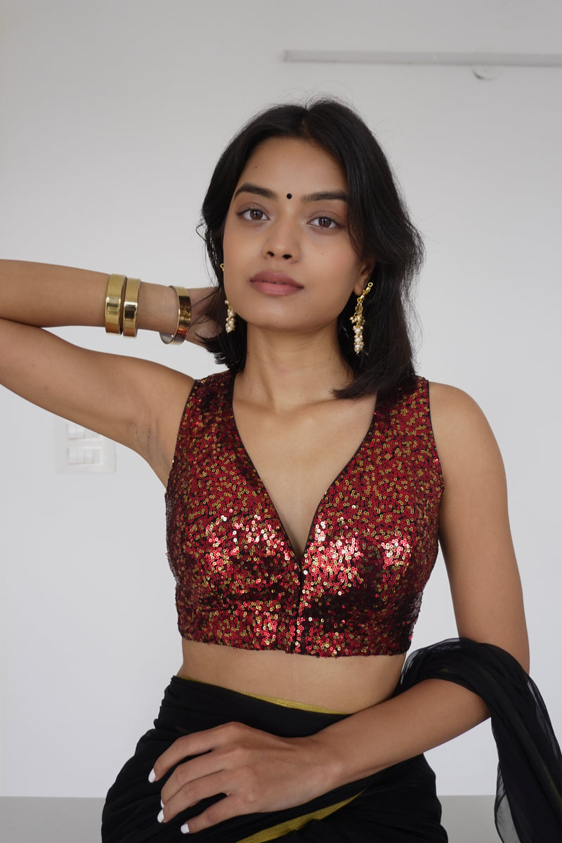 Lavanya x Tyohaar | Sleeveless Red Sequined Saree Blouse with Curved V-Neck-Binks