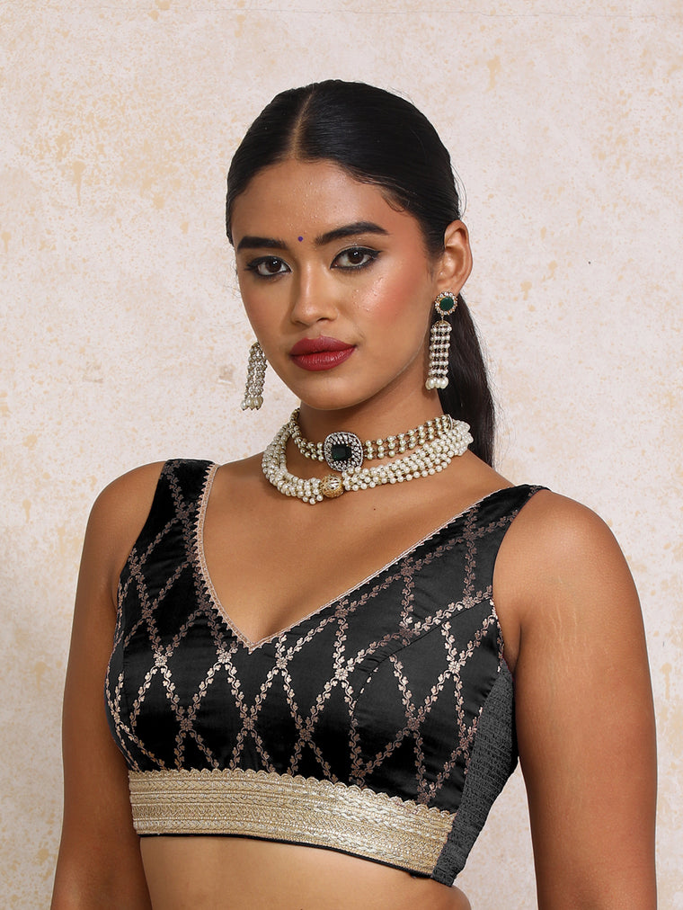 Liyana x Tyohaar Saree Blouse, in Black Viscose Silk Brocade, featuring sleeveless and curved v-neckline.