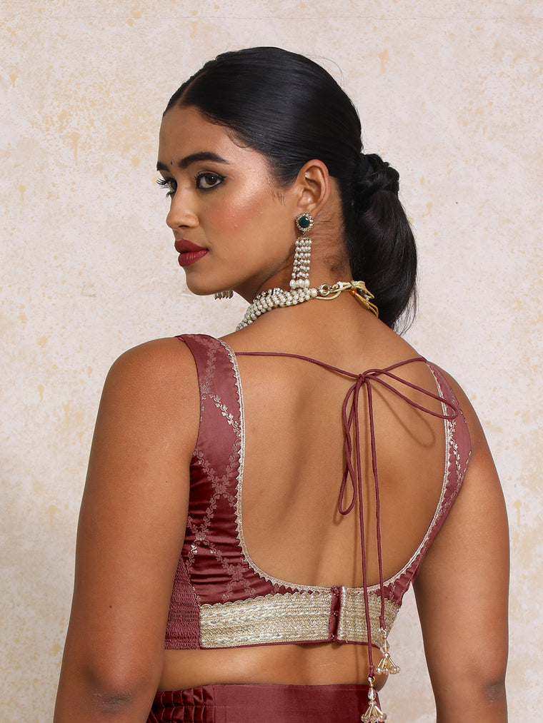 Liyana x Tyohaar Saree Blouse, in Maroon Viscose Silk Brocade, featuring sleeveless and curved v-neckline (view 2).