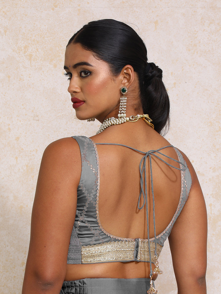 Liyana x Tyohaar Saree Blouse, in Grey Viscose Silk Brocade, featuring sleeveless and curved v-neckline (view 2).