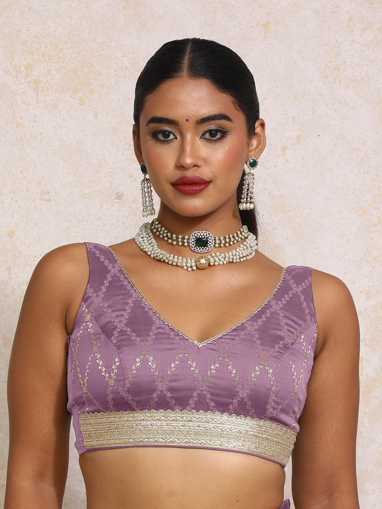 Liyana x Tyohaar Saree Blouse, in Purple Viscose Silk Brocade, featuring sleeveless and curved v-neckline.
