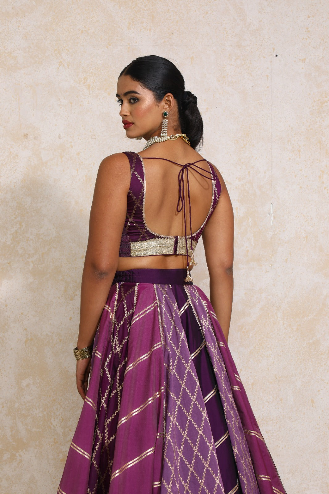 Liyana x Tyohaar Saree Blouse, in Purple Viscose Silk Brocade, featuring sleeveless and curved v-neckline (view 2).