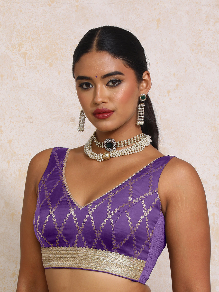 Liyana x Tyohaar Saree Blouse, in Purple Viscose Silk Brocade, featuring sleeveless and curved v-neckline.